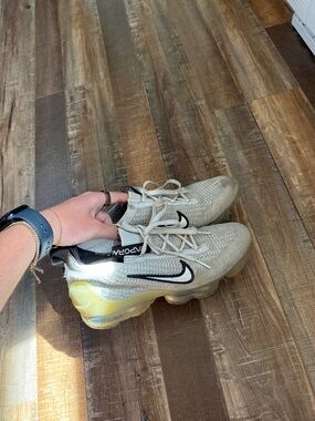 Nike VaporMax Flyknit Sneakers in Light Grey with Black Swoosh and Yellow Sole